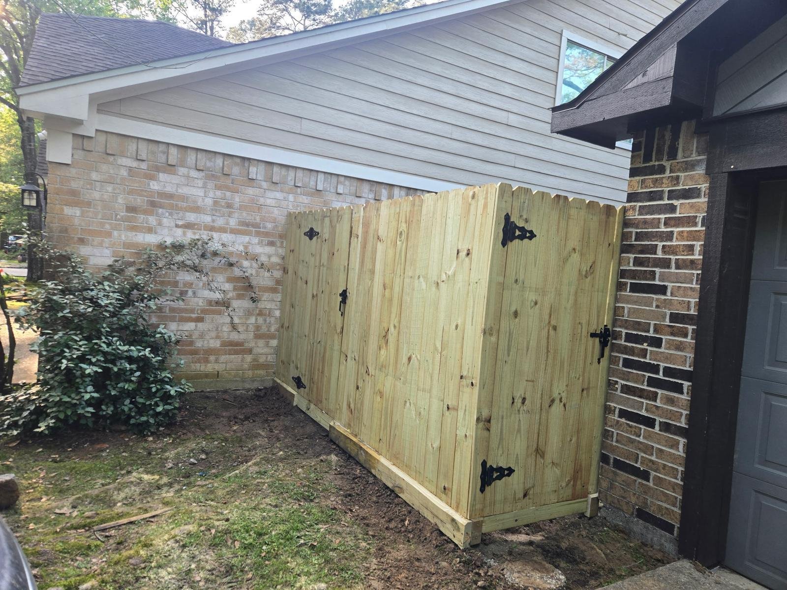 Premium pine wood fence installation showing clean lines and durable construction for residential property.